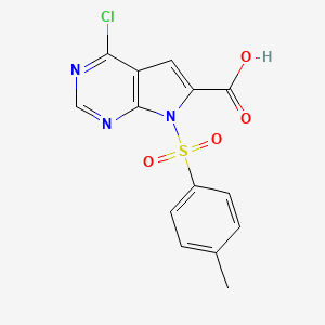 molecular formula C14H10ClN3O4S B13654623 4-Chloro-7-tosyl-7H-pyrrolo[2,3-d]pyrimidine-6-carboxylic acid 
