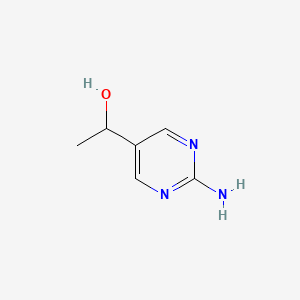 molecular formula C6H9N3O B13657555 1-(2-Aminopyrimidin-5-yl)ethanol 