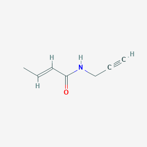molecular formula C7H9NO B13657936 (E)-N-(Prop-2-yn-1-yl)but-2-enamide 
