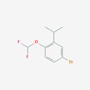 molecular formula C10H11BrF2O B13661687 4-Bromo-1-(difluoromethoxy)-2-isopropylbenzene 