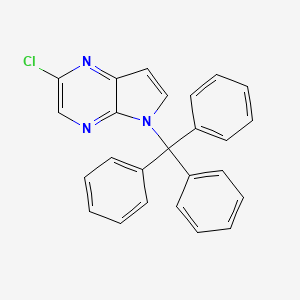 molecular formula C25H18ClN3 B13668724 2-Chloro-5-trityl-5H-pyrrolo[2,3-b]pyrazine 