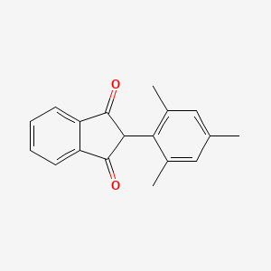 molecular formula C18H16O2 B13669632 1H-Indene-1,3(2H)-dione, 2-(2,4,6-trimethylphenyl)- CAS No. 15433-03-1