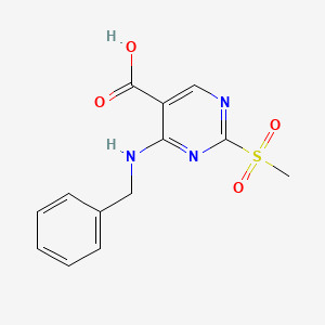molecular formula C13H13N3O4S B13670077 4-(Benzylamino)-2-(methylsulfonyl)pyrimidine-5-carboxylic acid 
