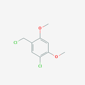 molecular formula C9H10Cl2O2 B13671450 1-Chloro-5-(chloromethyl)-2,4-dimethoxybenzene 