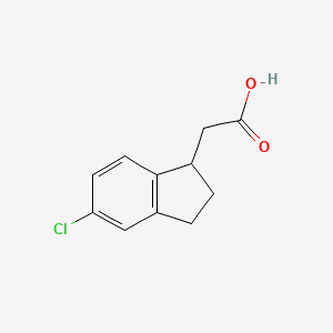 molecular formula C11H11ClO2 B13671624 2-(5-Chloro-2,3-dihydro-1H-inden-1-yl)acetic acid 