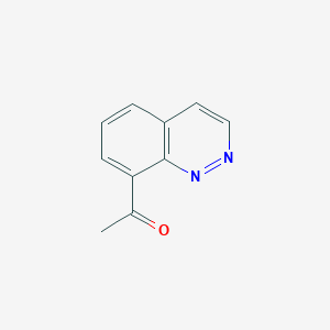 molecular formula C10H8N2O B13671971 1-(Cinnolin-8-yl)ethanone 
