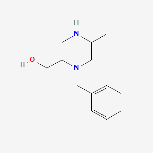 molecular formula C13H20N2O B13673375 [(2S,5R)-1-Benzyl-5-methyl-2-piperazinyl]methanol 