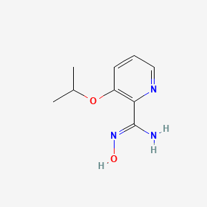 molecular formula C9H13N3O2 B13673903 N-Hydroxy-3-isopropoxypicolinimidamide 