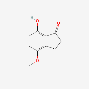 molecular formula C10H10O3 B1367509 7-Hydroxy-4-methoxy-1-indanone CAS No. 98154-04-2