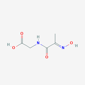 molecular formula C5H8N2O4 B136753 2-[[(2E)-2-hydroxyiminopropanoyl]amino]acetic acid CAS No. 133333-62-7