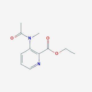 molecular formula C11H14N2O3 B13675607 Ethyl 3-(N-Methylacetamido)pyridine-2-carboxylate 