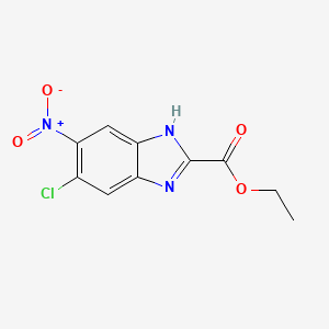 molecular formula C10H8ClN3O4 B13678684 Ethyl 6-Chloro-5-nitrobenzimidazole-2-carboxylate 