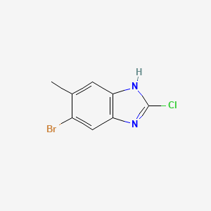 molecular formula C8H6BrClN2 B13678799 5-Bromo-2-chloro-6-methyl-1H-benzo[d]imidazole 