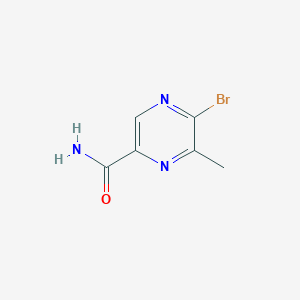 molecular formula C6H6BrN3O B13679893 5-Bromo-6-methylpyrazine-2-carboxamide 