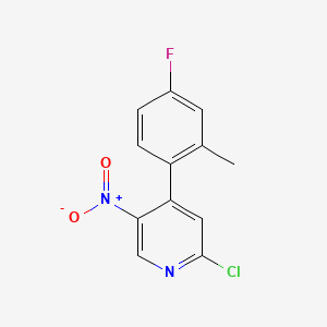 molecular formula C12H8ClFN2O2 B13681566 2-Chloro-4-(4-fluoro-2-methylphenyl)-5-nitropyridine 
