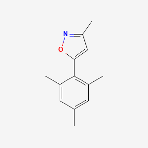 molecular formula C13H15NO B13681915 5-Mesityl-3-methylisoxazole 