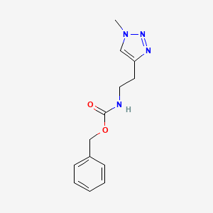 molecular formula C13H16N4O2 B13682249 benzyl N-[2-(1-methyltriazol-4-yl)ethyl]carbamate 