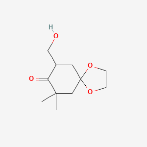 molecular formula C11H18O4 B13682269 9-(Hydroxymethyl)-7,7-dimethyl-1,4-dioxaspiro[4.5]decan-8-one 
