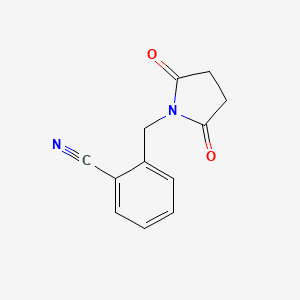 molecular formula C12H10N2O2 B1368455 2-[(2,5-Dioxopyrrolidin-1-yl)methyl]benzonitrile 