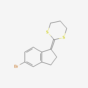 molecular formula C13H13BrS2 B13684681 2-(5-Bromoindane-1-ylidene)-1,3-dithiane 