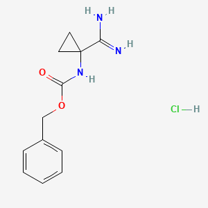 molecular formula C12H16ClN3O2 B13685057 Benzyl (1-carbamimidoylcyclopropyl)carbamate hydrochloride 