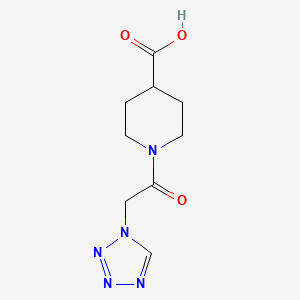 molecular formula C9H13N5O3 B1368525 1-[2-(1H-1,2,3,4-tetrazol-1-yl)acetyl]piperidine-4-carboxylic acid 