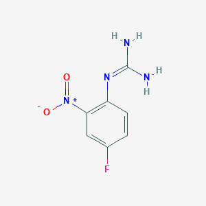 molecular formula C7H7FN4O2 B13685468 1-(4-Fluoro-2-nitrophenyl)guanidine 