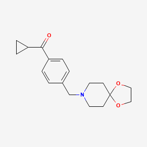 molecular formula C18H23NO3 B1368628 Cyclopropyl 4-[8-(1,4-dioxa-8-azaspiro[4.5]decyl)methyl]phenyl ketone CAS No. 898758-55-9