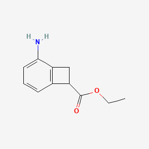 molecular formula C11H13NO2 B13690676 Ethyl 2-Aminobicyclo[4.2.0]octa-1,3,5-triene-7-carboxylate 