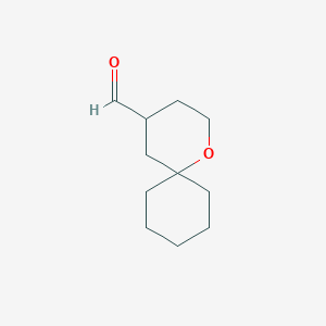molecular formula C11H18O2 B13690790 1-Oxaspiro[5.5]undecane-4-carbaldehyde 
