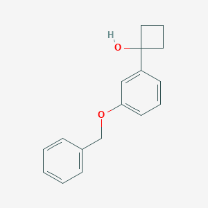 molecular formula C17H18O2 B1369600 1-(3-Benzyloxy-phenyl)-cyclobutanol 