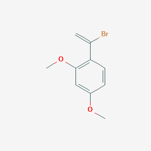 molecular formula C10H11BrO2 B13696302 1-(1-Bromovinyl)-2,4-dimethoxybenzene 