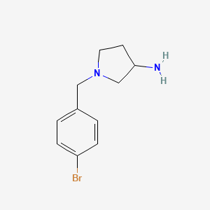 molecular formula C11H15BrN2 B1369887 1-[(4-Bromophenyl)methyl]pyrrolidin-3-amine 