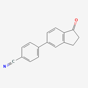 4-(1-oxo-2,3-dihydro-1H-inden-5-yl)benzonitrile