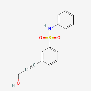 molecular formula C15H13NO3S B1371253 3-(3-Hydroxyprop-1-ynyl)-N-phenylbenzenesulfonamide 