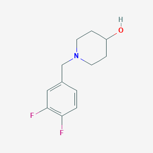 molecular formula C12H15F2NO B1371761 1-[(3,4-Difluorophenyl)methyl]piperidin-4-ol 