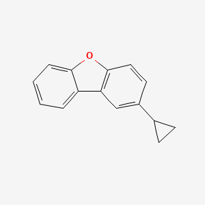 molecular formula C15H12O B13717625 2-Cyclopropyldibenzo[b,d]furan 