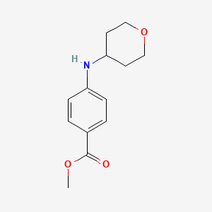 molecular formula C13H17NO3 B13723134 Methyl 4-[(oxan-4-yl)amino]benzoate 