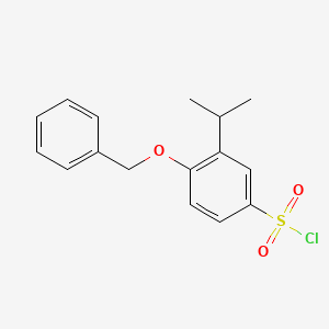 molecular formula C16H17ClO3S B1372356 4-(Benzyloxy)-3-isopropylbenzenesulfonyl chloride CAS No. 1094721-09-1
