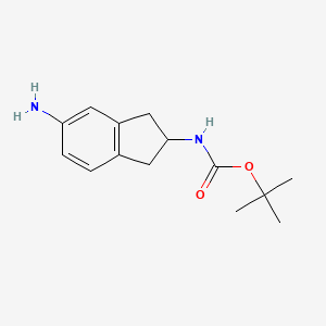 molecular formula C14H20N2O2 B1372741 tert-Butyl (5-amino-2,3-dihydro-1H-inden-2-yl)carbamate CAS No. 246873-45-0