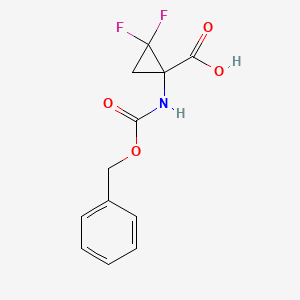 molecular formula C12H11F2NO4 B1373067 1-{[(Benzyloxy)carbonyl]amino}-2,2-difluorocyclopropane-1-carboxylic acid CAS No. 1240528-90-8