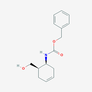 molecular formula C15H19NO3 B13733251 benzyl N-[(1S,6R)-6-(hydroxymethyl)cyclohex-3-en-1-yl]carbamate 