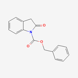 molecular formula C16H13NO3 B13736655 N-Carbobenzyloxyindol-2-one 