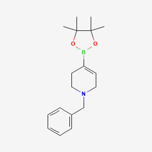 molecular formula C18H26BNO2 B1373690 1-Benzyl-4-(4,4,5,5-tetramethyl-1,3,2-dioxaborolan-2-YL)-1,2,3,6-tetrahydropyridine CAS No. 1048976-83-5