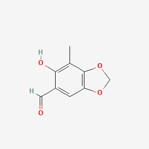 molecular formula C9H8O4 B13740050 1,3-Benzodioxole-5-carboxaldehyde,6-hydroxy-7-methyl- 
