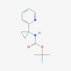 molecular formula C13H18N2O2 B1374648 2-[1-(Boc-amino)cyclopropyl]pyridine CAS No. 873221-80-8