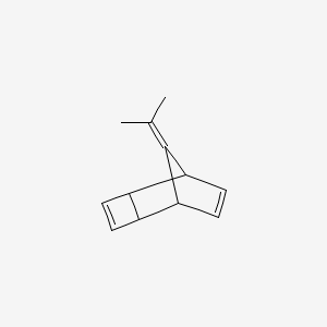 molecular formula C12H14 B13747697 Tricyclo(4.2.1.02,5)nona-3,7-diene, 9-(1-methylethylidene)-,(1alpha,2alpha,5alpha,6alpha)- CAS No. 27237-73-6