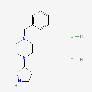 molecular formula C15H24ClN3 B1374873 1-Benzyl-4-(3-pyrrolidinyl)piperazine dihydrochloride CAS No. 1220038-32-3