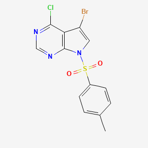 molecular formula C13H9BrClN3O2S B1375007 5-bromo-4-chloro-7-(4-methylbenzenesulfonyl)-7H-pyrrolo[2,3-d]pyrimidine CAS No. 1143534-78-4