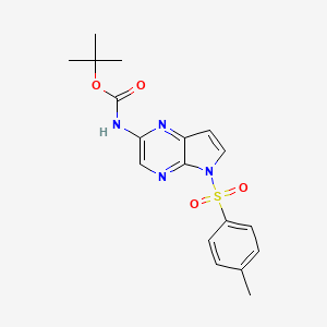 molecular formula C18H20N4O4S B1375033 tert-butyl N-[5-(4-methylbenzenesulfonyl)-5H-pyrrolo[2,3-b]pyrazin-2-yl]carbamate CAS No. 1201187-44-1